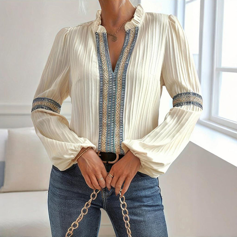 Boho Chic Colorblock Blouse featuring V-neck and lantern sleeves in beige, paired with stylish denim.